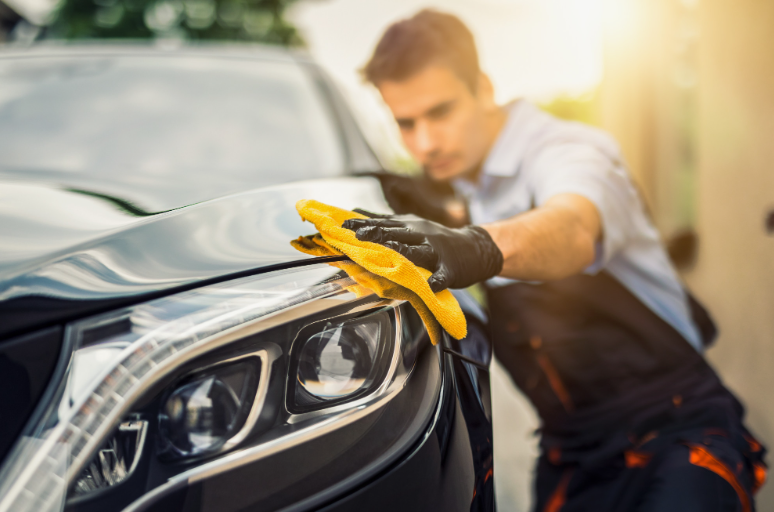 man busy in car washing